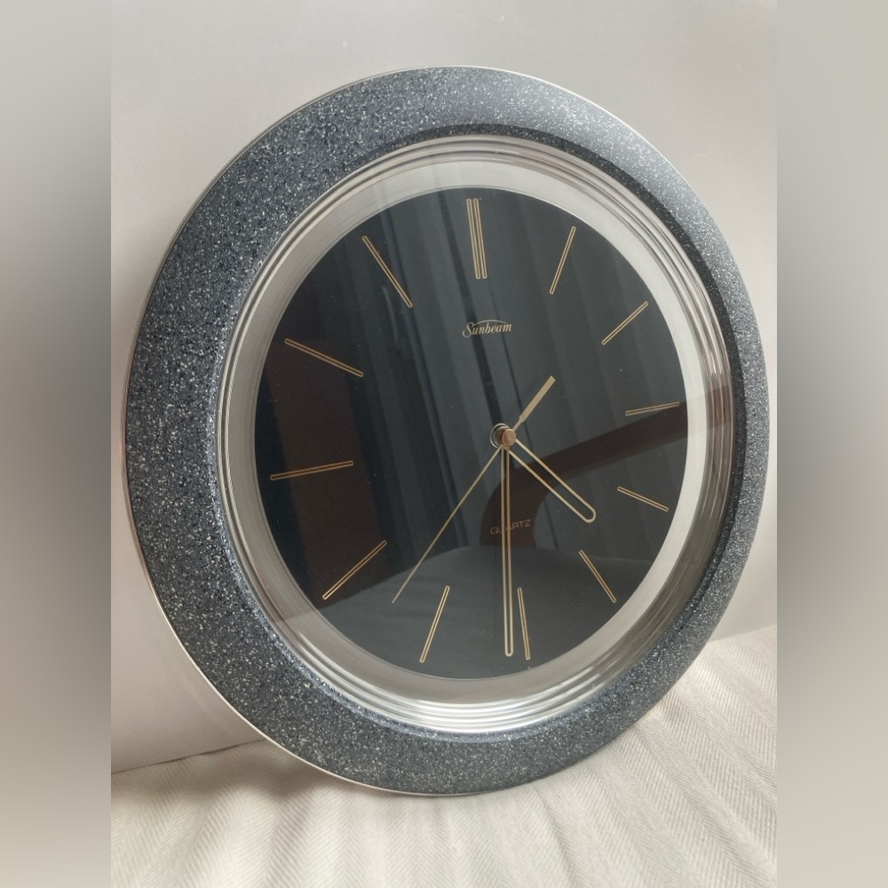 Sunbeam Black Clock with Sparkling Silver Frame and Gold Accents